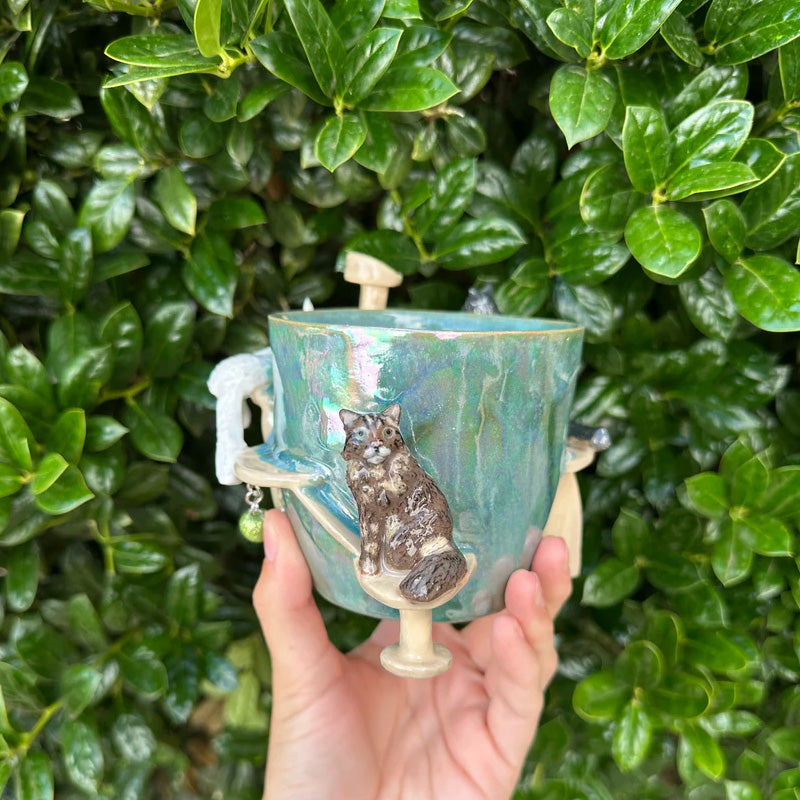 Kittens Around The Water Cup