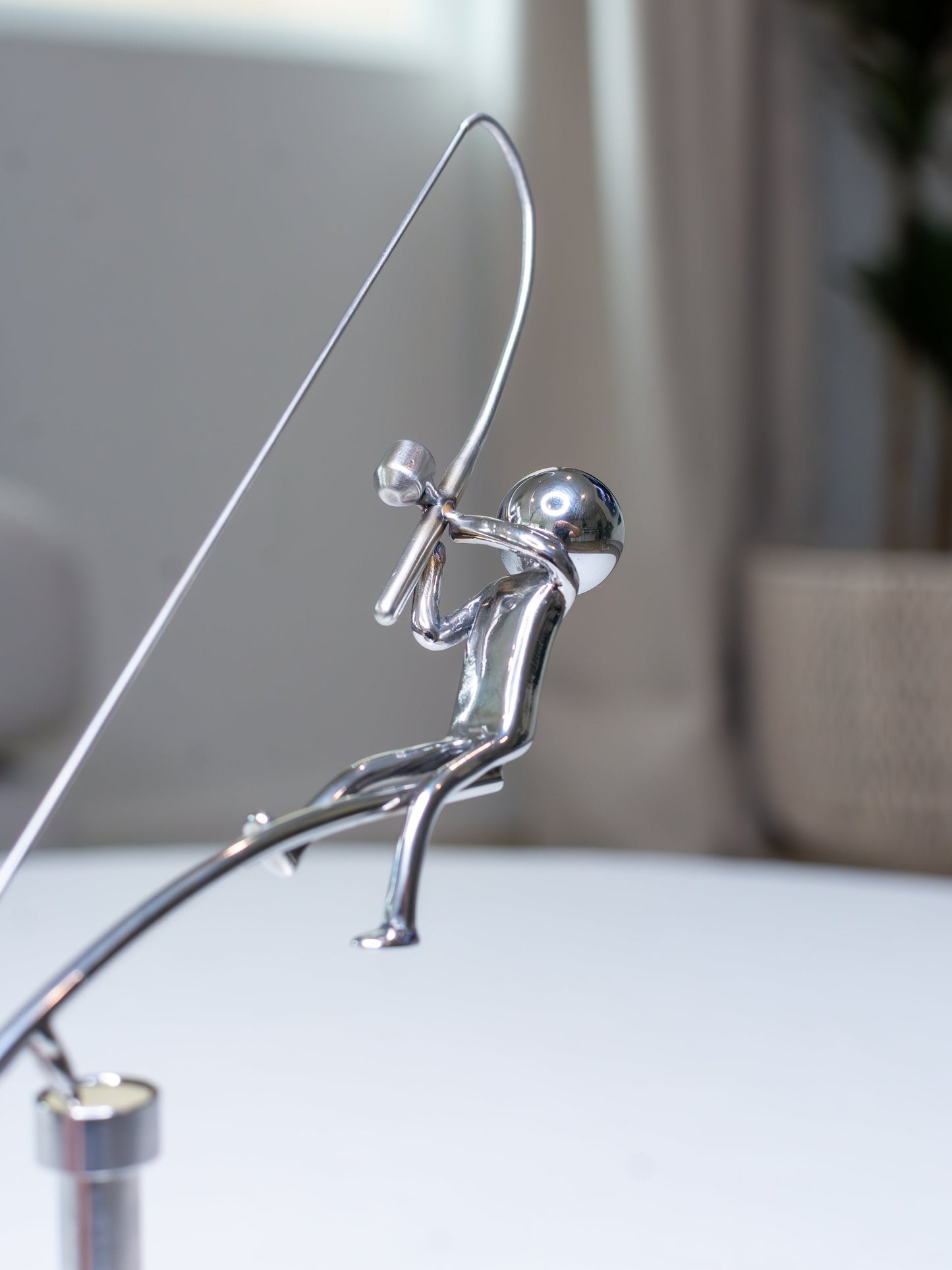 Kinetic Fisherman Sculpture