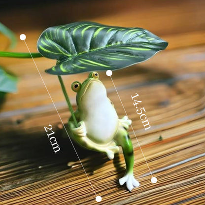 Little frog sheltering from the rain